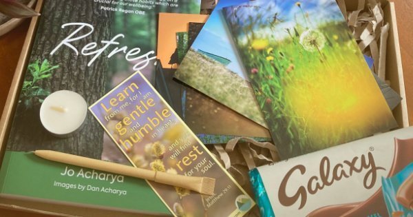 Featured image for store showing the Refresh classic gift box with book, postcards and chocolate bar